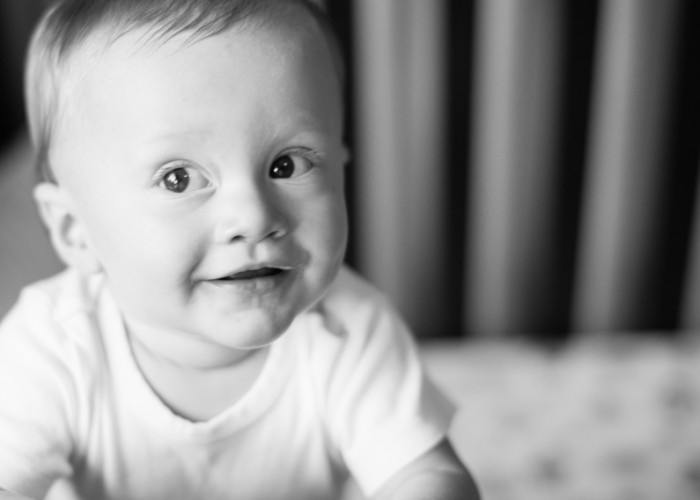 One year old redhead with the cutest smile