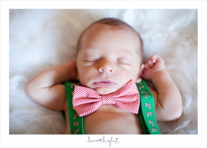 Newborn baby boy at Christmas time photo session